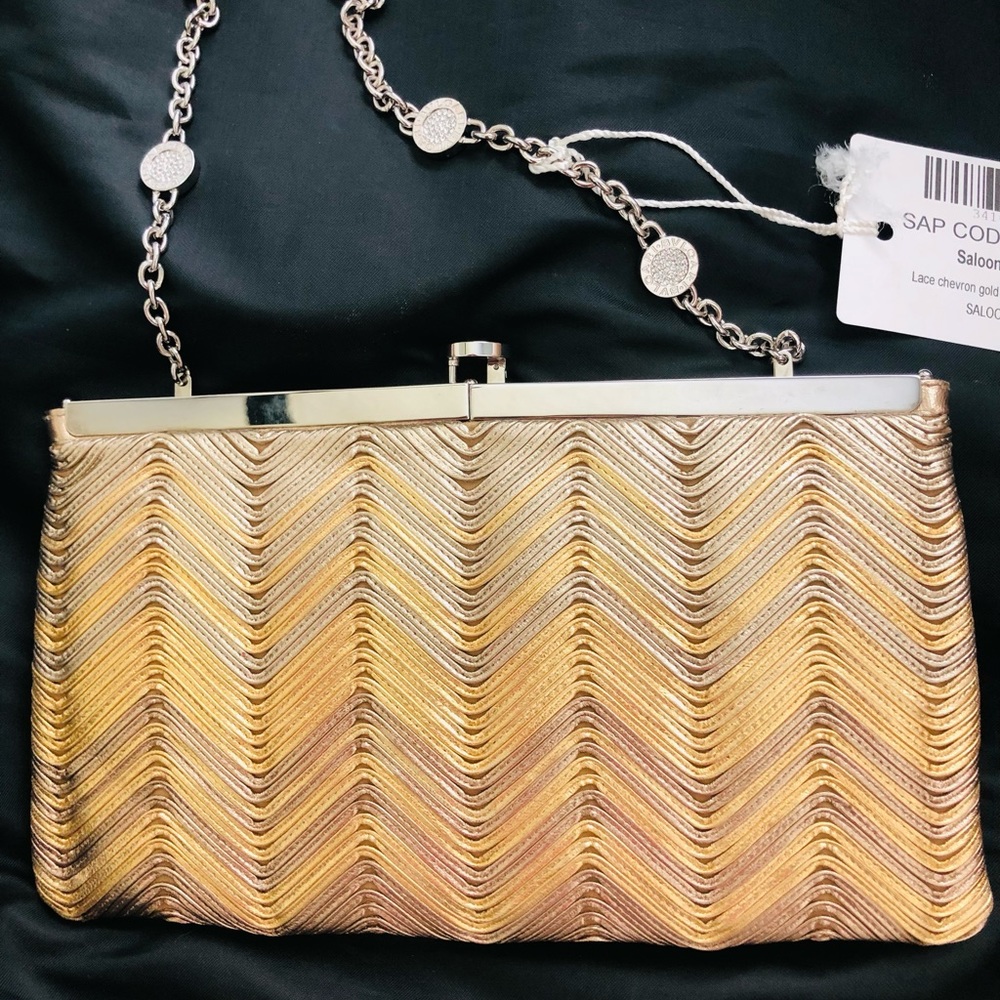 Bvulgari small gold Leather clutch handbag new with tags 100 percent AUTHENTIC!